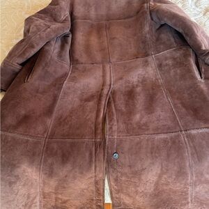 Luxurious full length shearling coat.